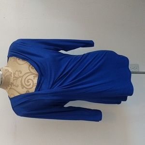 Electric blue long top with unique neckline and front.